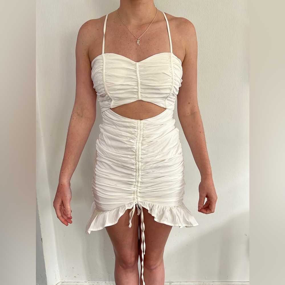 White ruffled mini dress from Anthropologie